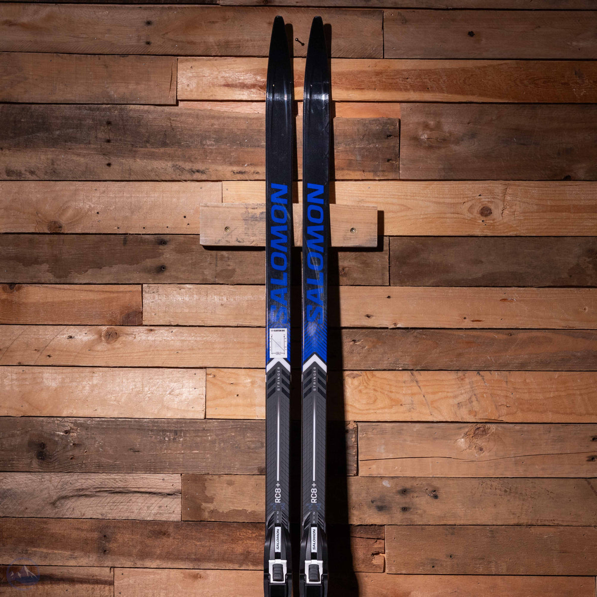 2027 Salomon RC8+ eSkin Skis with Salomon RC7 Prolink Boots and Poles